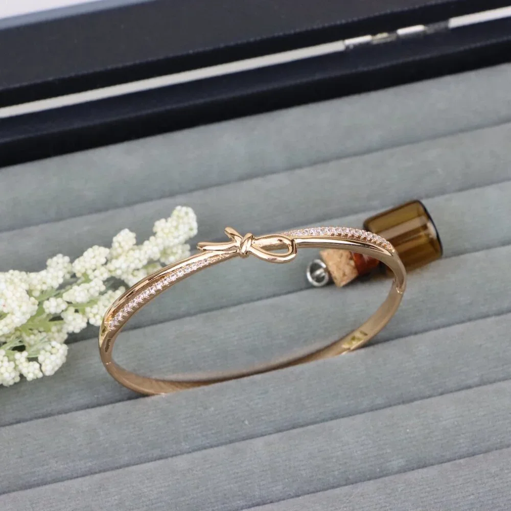 Rose Gold Bow Knot Bangle with Sparkling CZ Accents, XPBL0427